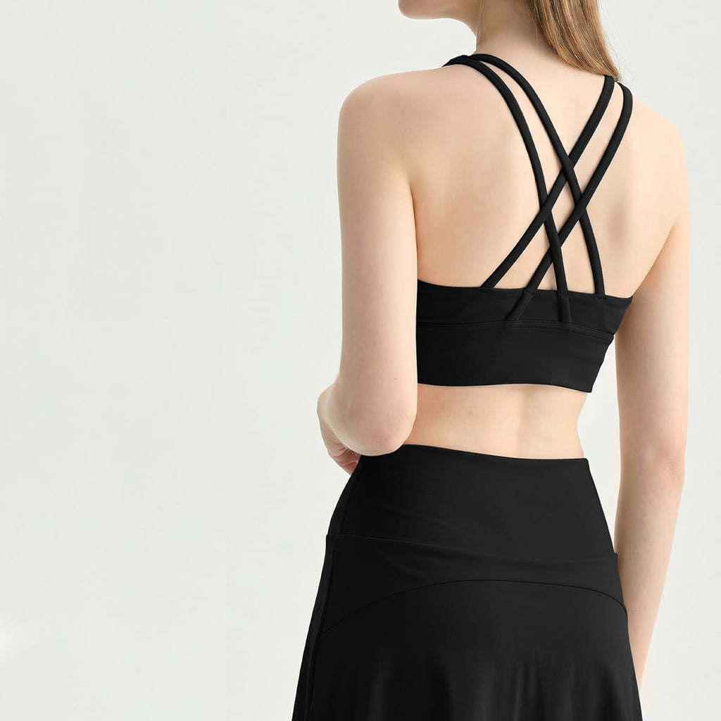 Back view of a classic black double criss-cross strappy gym bra.