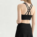 Back view of a classic black double criss-cross strappy gym bra.