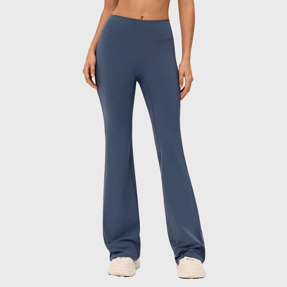 Women's high rise booty lifting flare activewear pants in steel blue with custom logo, direct clothing manufacturer - front view.