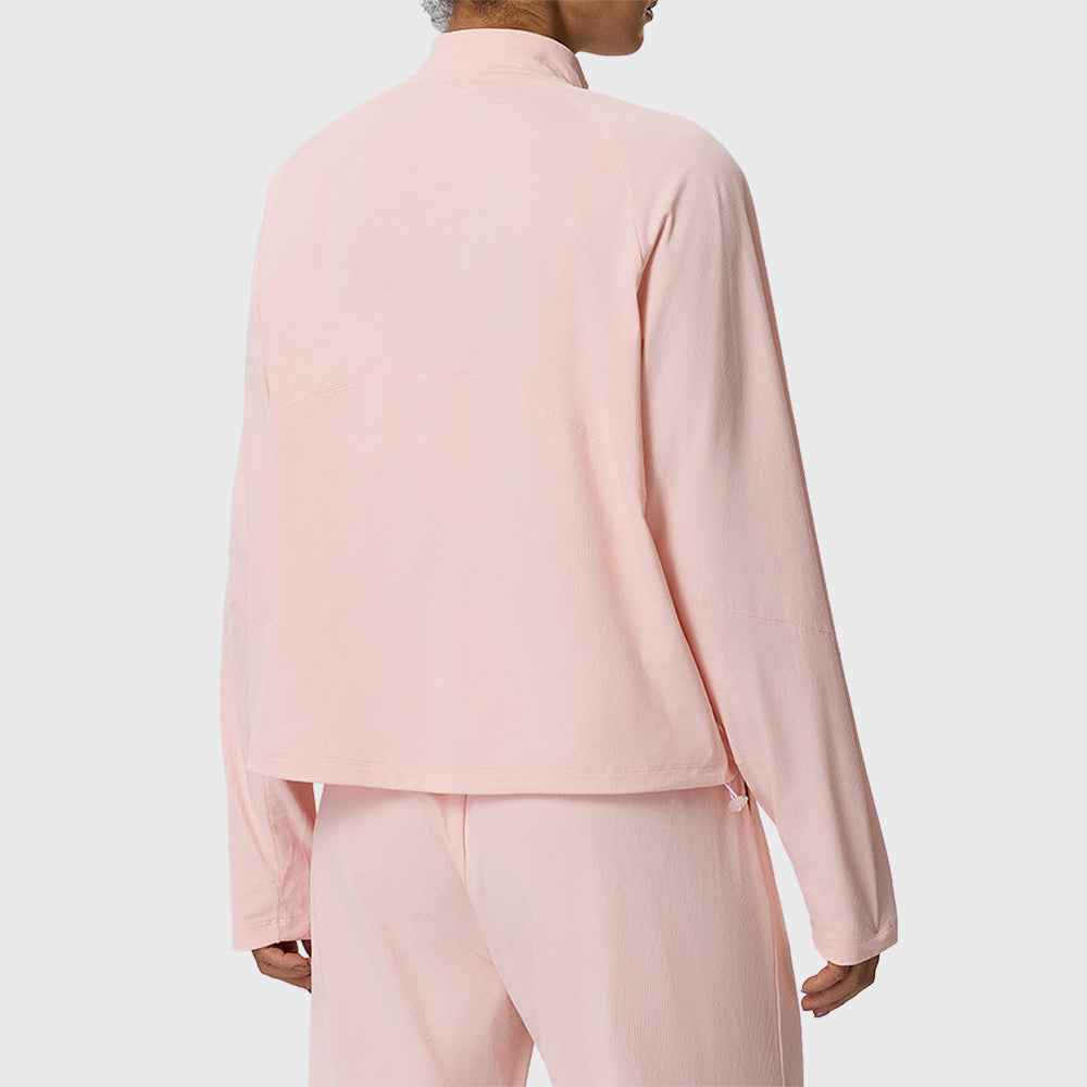 Back view of women's waffle knit half zip pullover sweatshirt in light pink with custom logo, sportswear manufacturer.